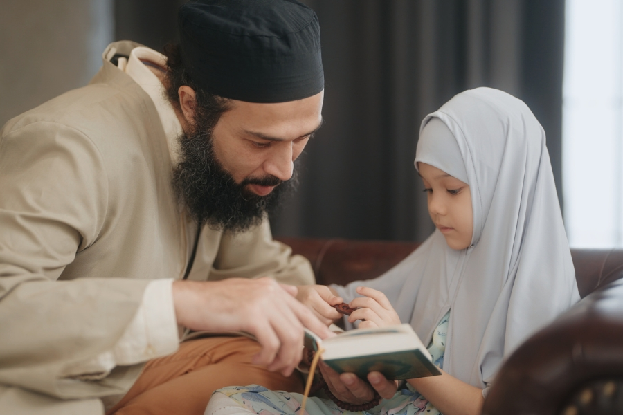 Children or adults reading Quran